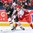 BUFFALO, NEW YORK - DECEMBER 30: Canada's Taylor Raddysh #16 and Denmark's Andreas Grundtvig #22 battle for the puck during the preliminary round of the 2018 IIHF World Junior Championship. (Photo by Andrea Cardin/HHOF-IIHF Images)

